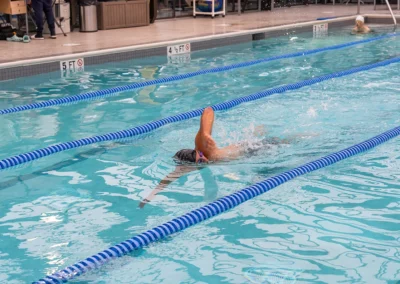 Swimmer performing laps in the pool at Newport Swim and Fitness.